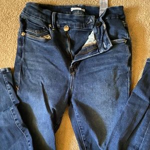 Good American crossover button jeans